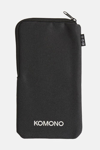 Étui à lunettes noir de KOMONO avec une fermeture éclair en haut et une texture tissée.