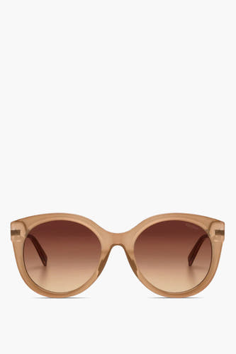 Lunettes de soleil beige de KOMONO, avec un dégradé marron sur les verres et un cadre classique.