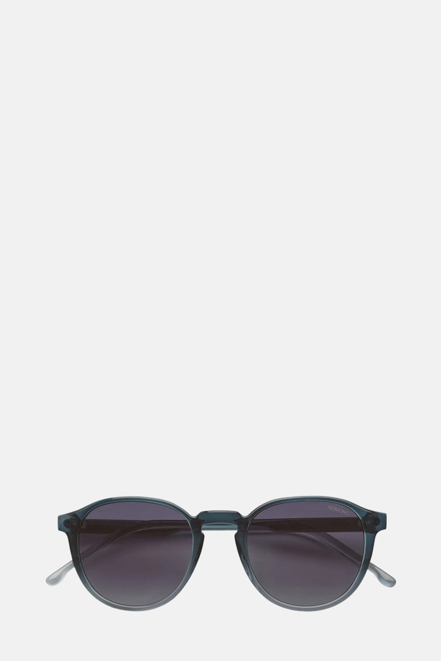 Lunettes de soleil bleues de Komono, avec des verres foncés et un cadre arrondi.