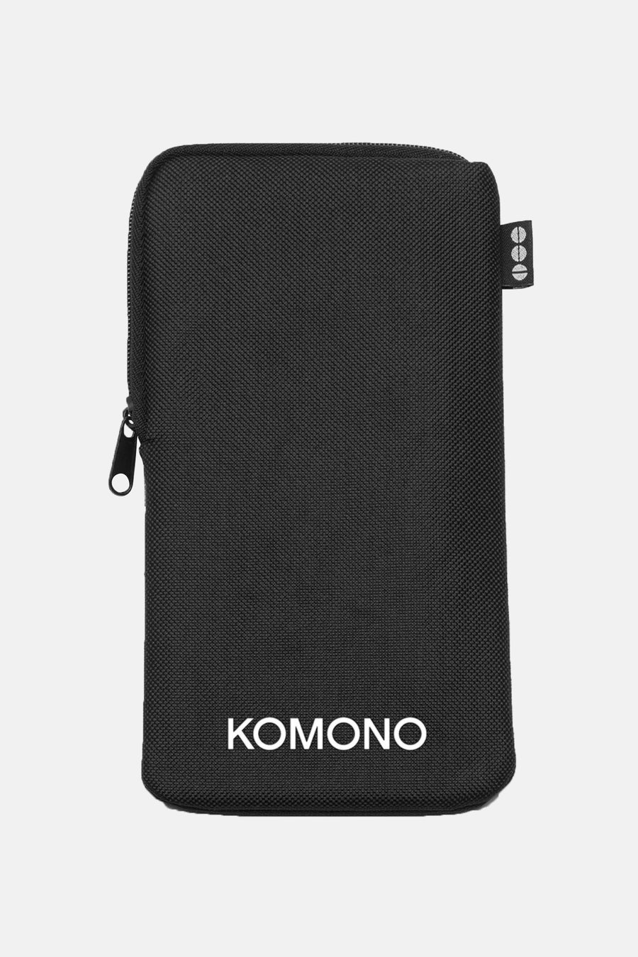 Étui à lunettes noir de KOMONO, avec fermeture éclair et une subtile texture granuleuse.