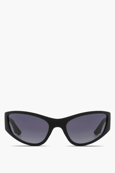 Lunettes noires de KOMONO, avec un cadre élégant et moderne.