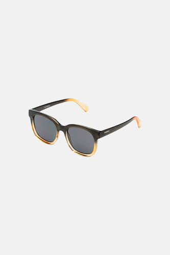 Lunettes de soleil marron de KOMONO, avec une monture dégradée de foncé à clair et des verres foncés.