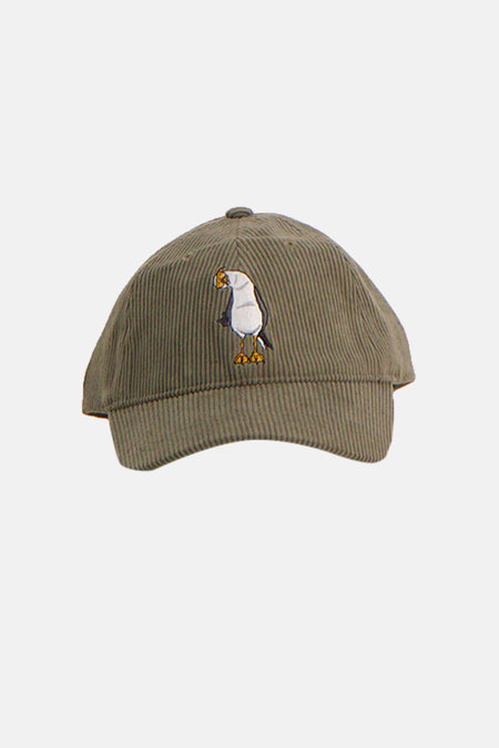Casquette verte LAKOR avec texture velours côtelé et un motif d'oiseau brodé.