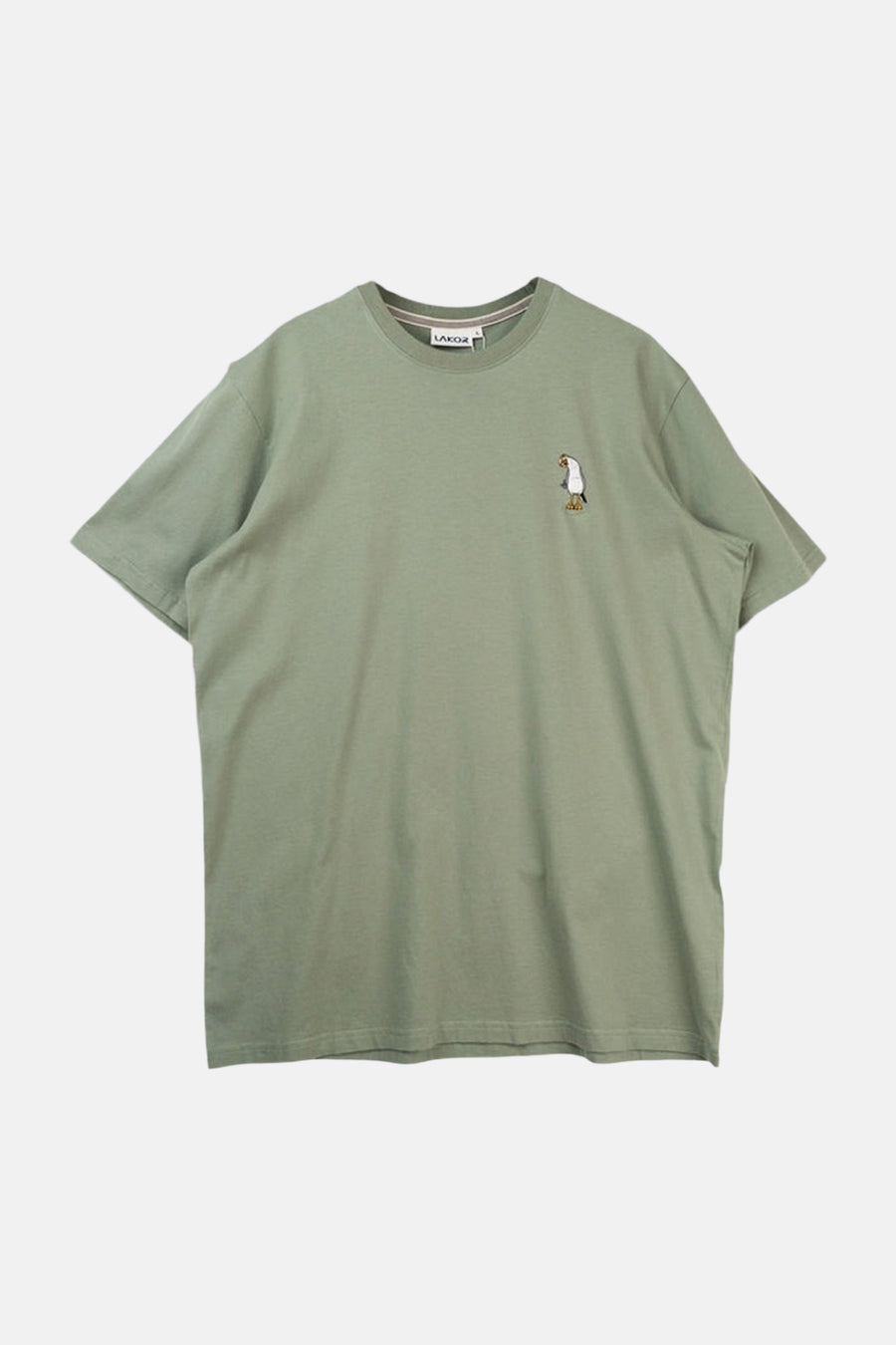 T-shirt vert à manches courtes de LAKOR, avec une petite illustration de pingouin sur la poitrine.