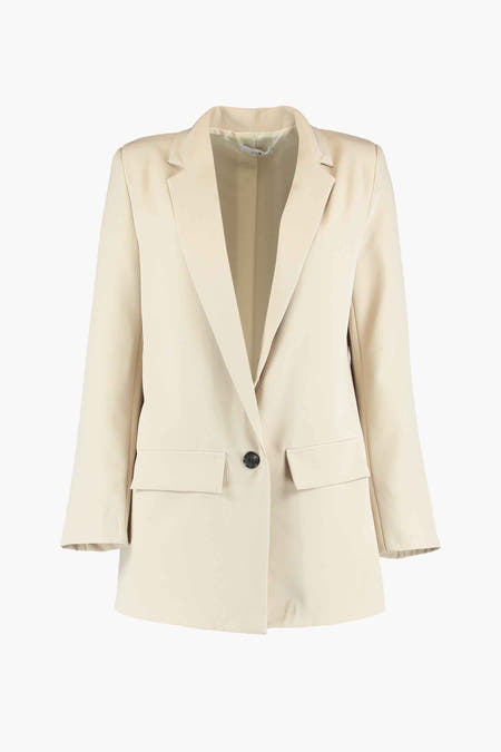 Blazer beige de HAILYS à manches longues, col reversible et poches brodées, fermé par un bouton.