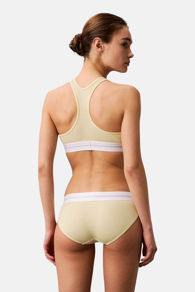 Gaine de Calvin Klein, avec une bande blanche, le dos est visible.
