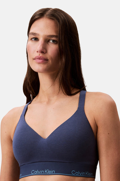 Manteau bleu Calvin Klein, avec une bande élastique à logo de marque.