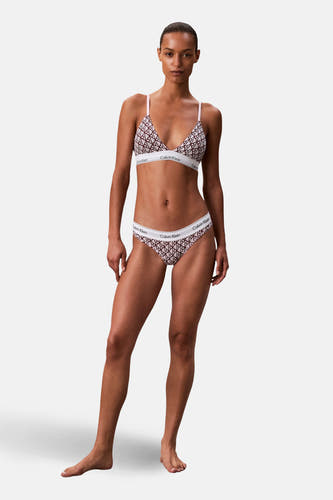 Slip rouge de Calvin Klein, avec un élastique blanc et un motif géométrique.