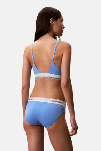 Culotte bleue Calvin Klein, vue de dos, avec ceinture blanche et logo de la marque.