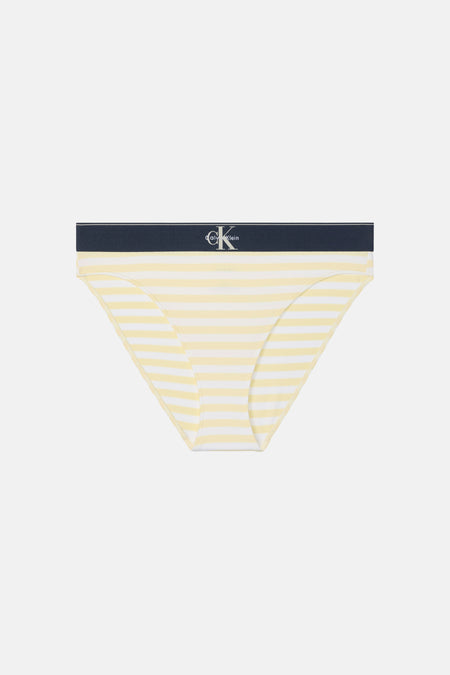 Culotte jaune Calvin Klein à rayures blanches et ceinture élastique bleu foncé.