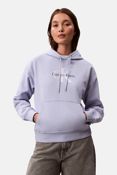 Gilet marron de Calvin Klein, avec logo de la marque sur l'avant et côtes avec des extrémités métalliques.