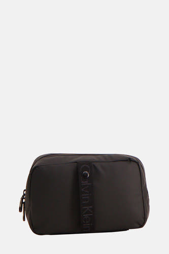 Toilettes noires Calvin Klein, avec fermeture éclair et logo.