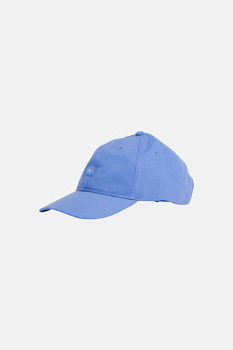 Casquette bleue Calvin Klein avec logo 'CK' brodé, en vue de profil.