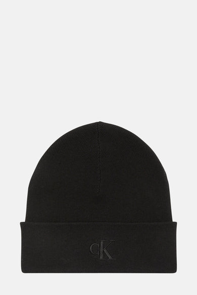 Mauvais esprit de Calvin Klein, avec une texture tricotée et le logo CK sur la couverture.