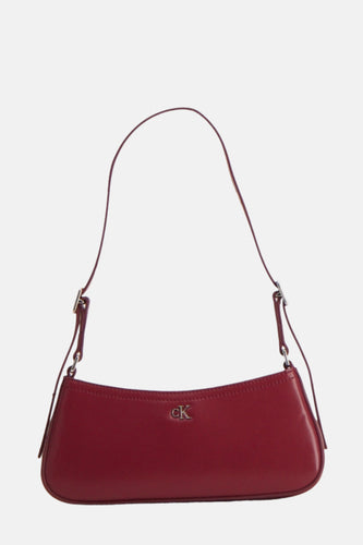 Rode leren Calvin Klein tas met schouderband.
