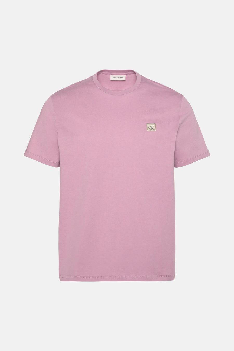 T-shirt rose à manches courtes de Calvin Klein Jeans, avec un petit logo sur la poitrine.