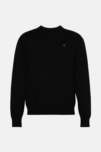 Gilet noir de Calvin Klein, avec un petit logo sur la poitrine et des manches longues.