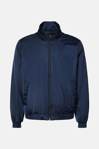 Veste de pluie bleue Calvin Klein avec des manches longues et une fermeture éclair.