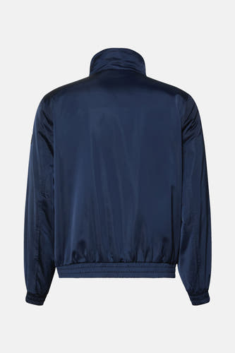 Veste de pluie bleue Calvin Klein, vue par derrière, avec une col montante et une ceinture élastique.