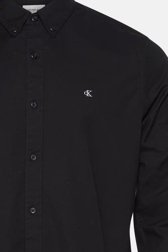 T-shirt noir à manches longues de Calvin Klein Jeans, avec un logo brodé sur la poitrine.
