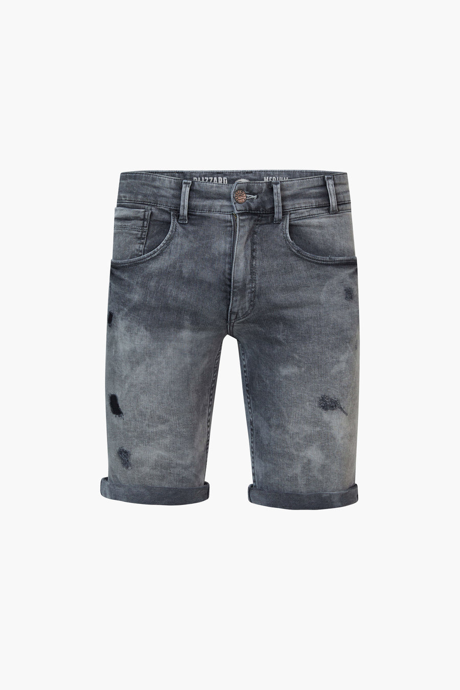 Jean court en denim bleu marine de Petrol Industries avec des taches oxydées et des jambes retroussées.