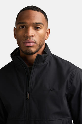 Veste courte noire de Petrol Industries® avec fermeture éclair et logo discret sur la poitrine.