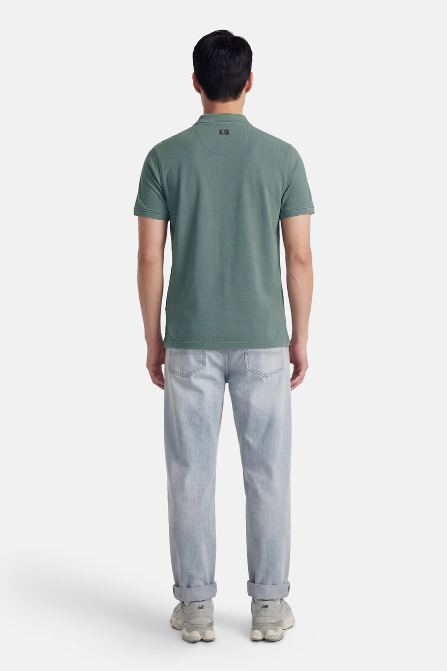 Polo verte de Petrol Industries, à manches courtes, à porter avec un jean et des baskets.