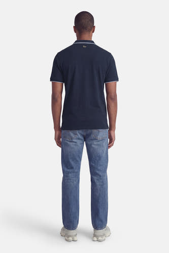 Polo bleue de Petrol Industries à manches courtes avec des accents blancs au col et aux manches.