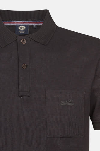 Polo noire à manches courtes de Petrol Industries avec poche poitrine, finition boutonnée.