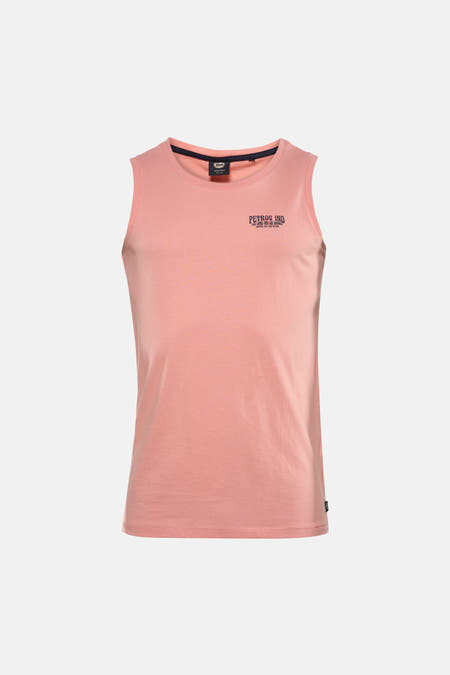 Débardeur rose de Petrol Industries, avec imprimé citrons au dos, combiné avec un jean gris et des baskets.
