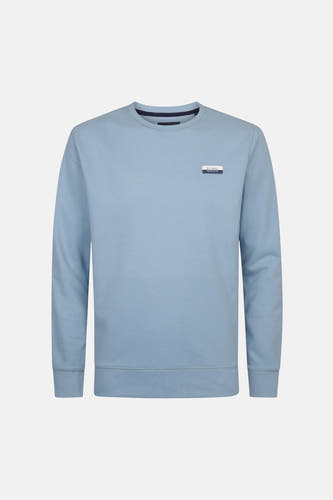 Sweat-shirt bleu avec col rond de Petrol Industries, avec un petit logo sur la poitrine.