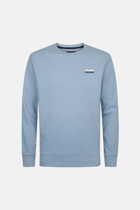Sweat-shirt bleu avec col rond de Petrol Industries, avec un petit logo sur la poitrine.