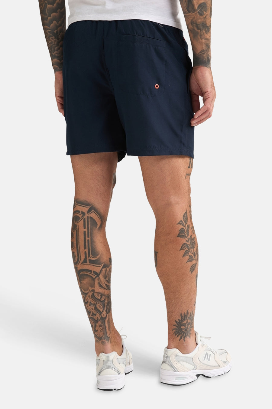 Blauwe zwemshort van Petrol Industries®, met een achterzak met oranje detail.