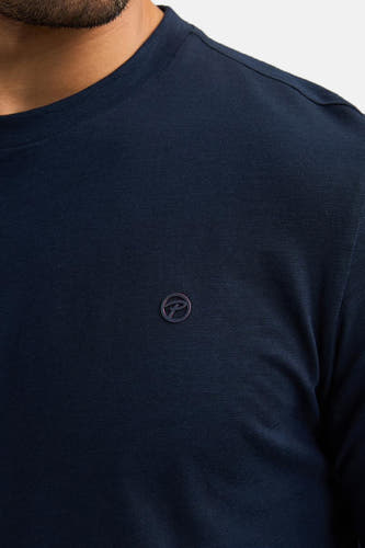 T-shirt bleu à manches longues de Petrol Industries, avec un petit logo sur la poitrine.