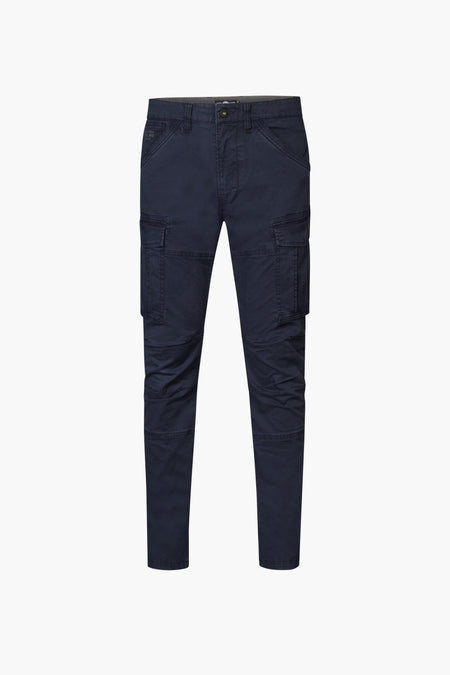 Pantalon de travail bleu de Petrol Industries, avec des poches et des genouillères.