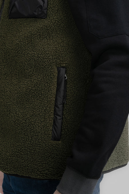 Gilet vert de Petrol Industries Industries Industries texture douureur ted et et et détails noirs.