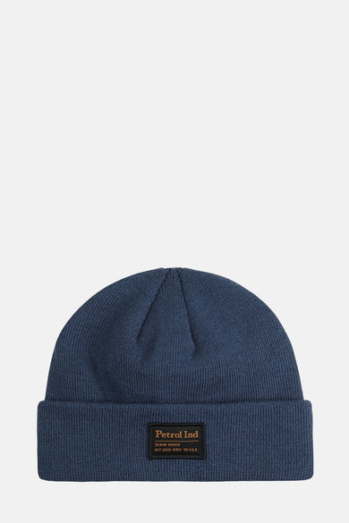 Casque bleu de Petrol Industries, avec une texture tricotée et un étiquette brodé.