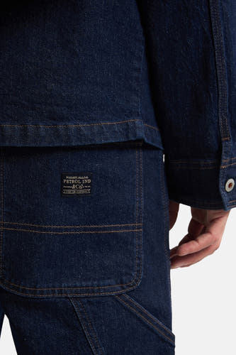 Veste en jeans bleu de Petrol Industries avec détail de poche et fermeture à boutons.