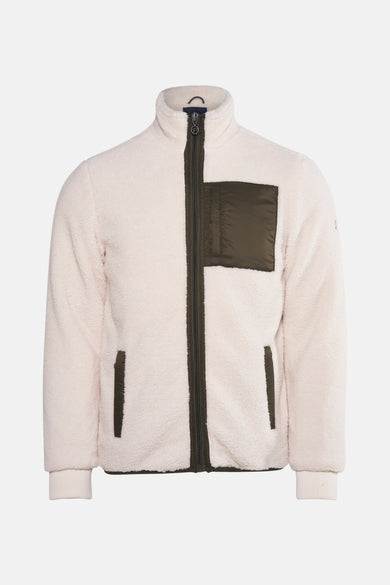 Veste courte écru de Petrol Industries, avec une texture polaire, fermeture éclair et accents verts.