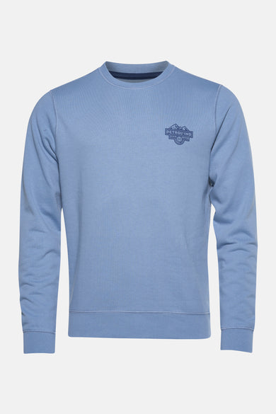 Sweat-shirt bleu de Petrol Industries avec un col rond et une impression inspirée par le vintage sur la poitrine.