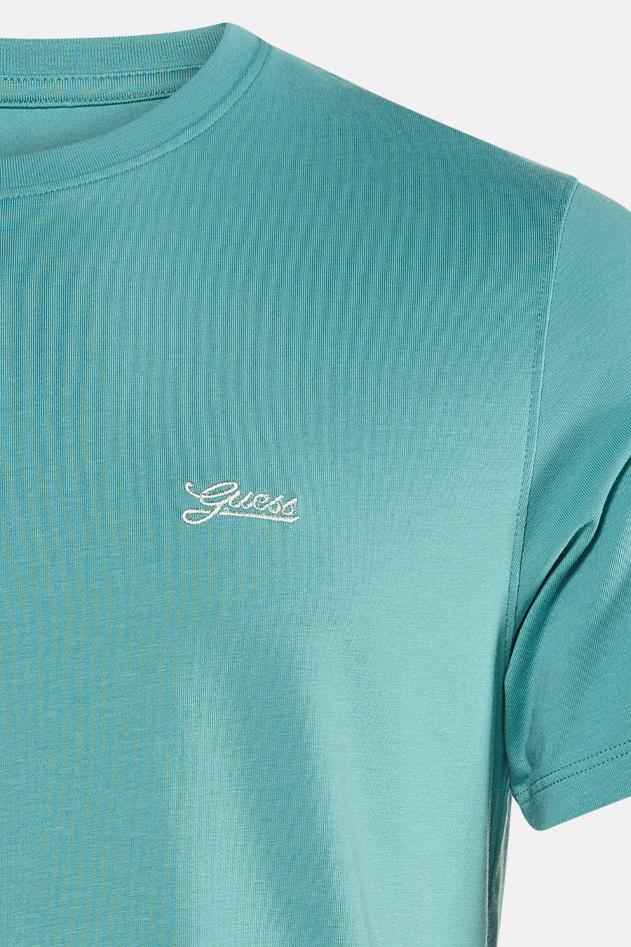 T-shirt vert à manches courtes de Guess, avec un discret logo imprimé sur la poitrine et une fine structure côtelée.