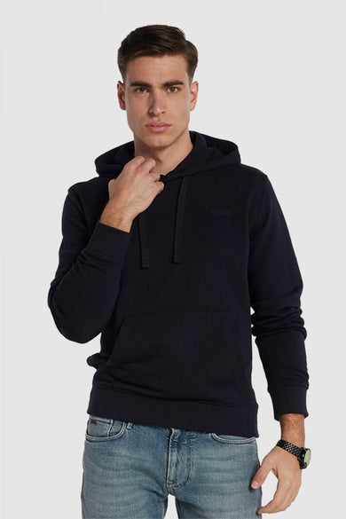 Gilet noir avec capuche de Guess portant l'inscription 'Guess 1981' sur la fermeture éclair.