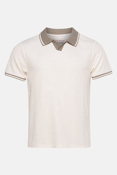 Polo beige à manches courtes de Guess, avec col et poignets rayés.