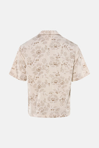 Chemise beige à manches courtes de Guess, avec un motif floral.