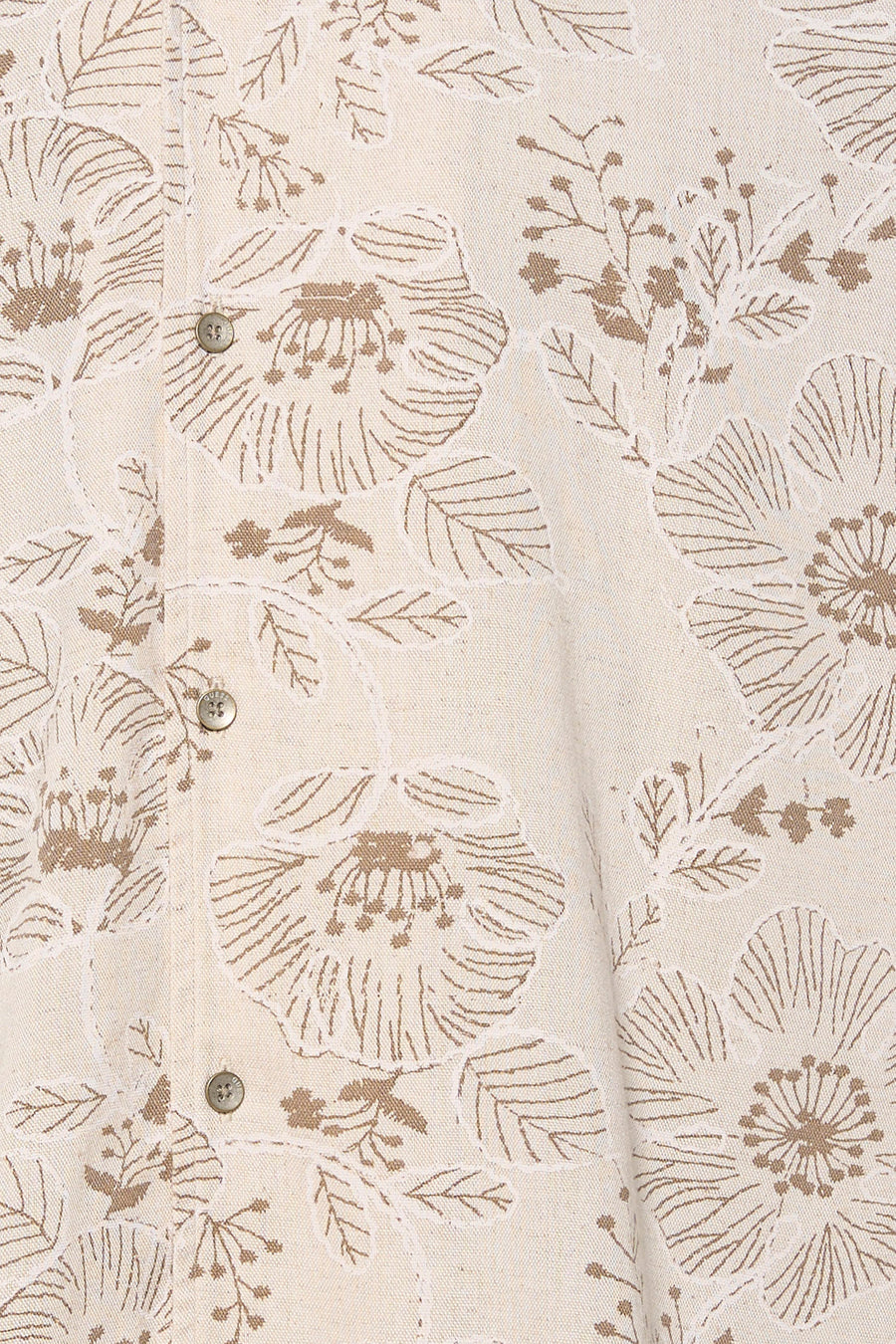 Chemise beige à manches courtes de Guess, avec motif floral et boutons apparents.