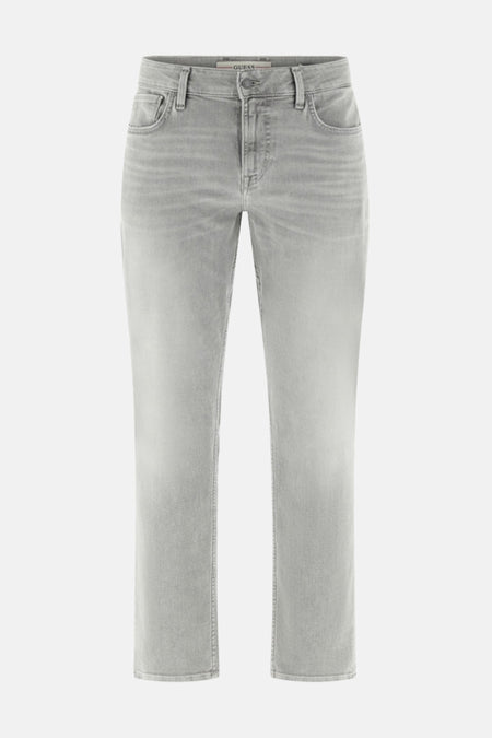 Jean slim de denim gris clair de Guess, modèle droit et simple.