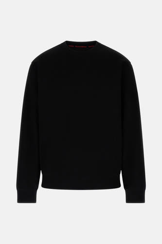 Gilet noir de Guess avec un col rond et des manches longues.