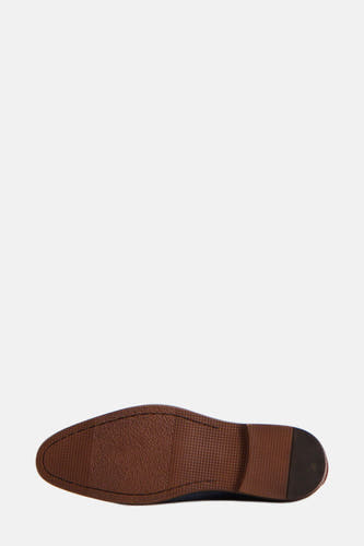 Bottines bleues de Le Fabuleux Marcel de Bruxelles, avec une semelle brune et une subtile texture.