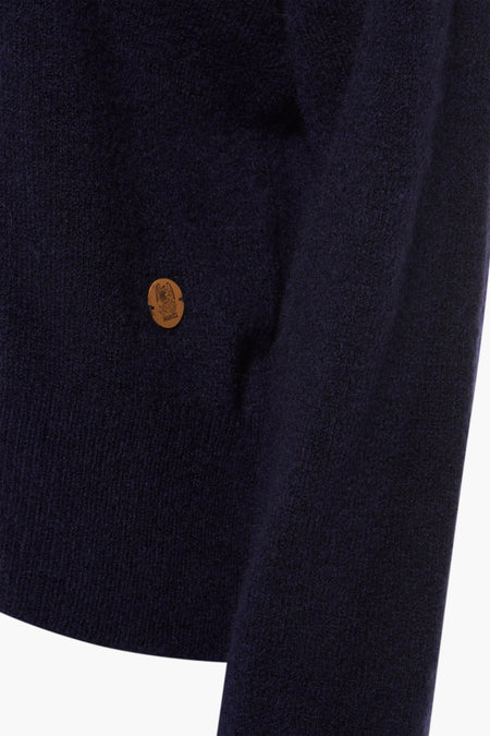 T-shirt bleu avec col rond de Le Fabuleux Marcel de Bruxelles, avec petit logo de marque.