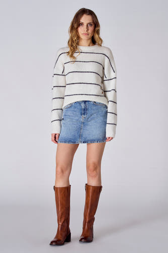 Short light blue denim skirt from Le Fabuleux Marcel de Bruxelles, combined with a striped sweater and brown boots.